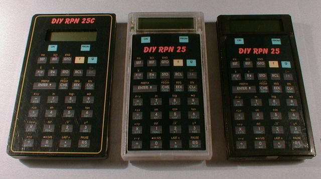 A DIY1 and two DIY2 calculators.
The DIY1 uses a modified off-the-shelf case with a laminated photo paper overlay.
The DIY2 us